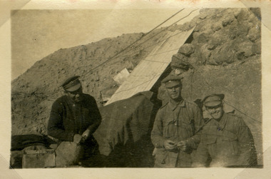 soliders posing in trench
