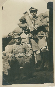 soldiers posing in trench