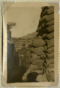 soldiers posing in trench