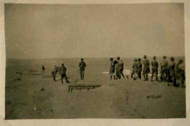 Soldiers digging trench