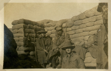 soldiers posing in trench