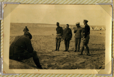 soldiers posing in camp