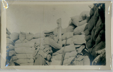 officer looking over trench with periscope, red cliffs00215.tif