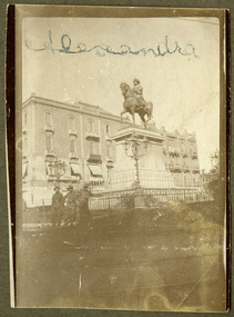 soldiers posing infront of statue, robertson thomas077.tif