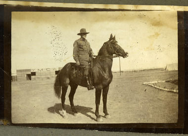 soldier posing on horse, robertson thomas079.tif