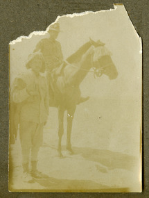 Soldiers posing on horse, robertson thomas081.tif
