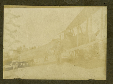 posing infront of plane, robertson thomas113.tif