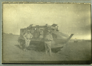soldiers posing in front of armoured vehicle, robertson thomas174.tif
