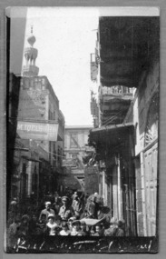 soldier in street scene, robertson thomas175.tif
