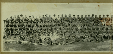 posed group of soldiers with band, robertson thomas181.tif
