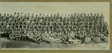 posed group of soldiers with band, robertson thomas182.tif