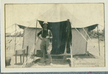 Soldier posing in camp