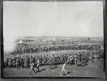 soldiers in camp watching spectacle