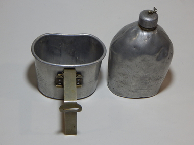 Memorabilia - Metal water bottle and drinking vessel, Water bottle is dated 1918.  Nothing shown on drinking vessel