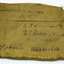 Khaki fabric, rectangular shape, with handwritten text in black ink, showing Ballarat East address, like an envelope.