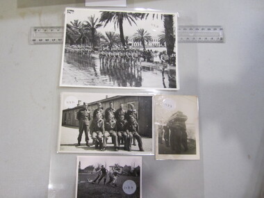 Photographs x 4 - laminated sheet