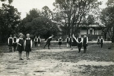 Photograph - original, Children in playground with Torrington House in background, 1927