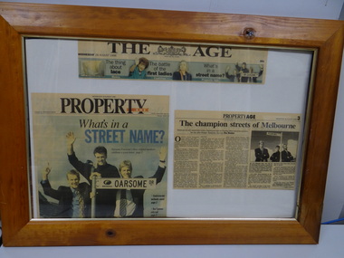 Framed newspaper clippings, 1996