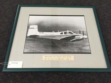 Photograph, framed, Beechcraft Twin Bonanza which served as the first Air Ambulance, 1965-1971