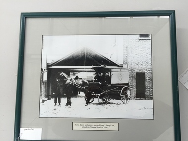Photograph, framed, Horse-drawn ambulances operated from 2 Lang Lane behind the Windsor Hotel-circa 1888