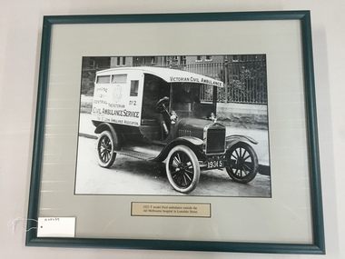 Photograph, framed, 1923 T Model Ford outside the old Melbourne Hospital in Lonsdale Street