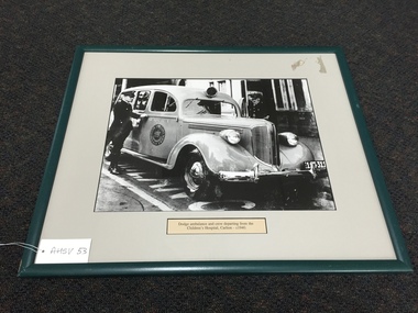 Photograph, framed, Dodge ambulance and crew departing from the Children's Hospital, Carlton - circa 1940