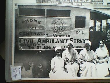 Photograph, Ambulance and nurses, Circa 1920