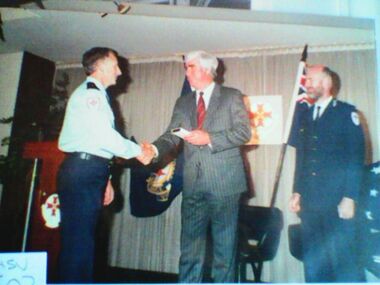 Photograph, medals presentation to Bob Tomlinson, 1988 to 1989