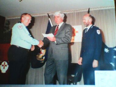 Photograph, award presentation to Chas Martin, 1988 to 1989