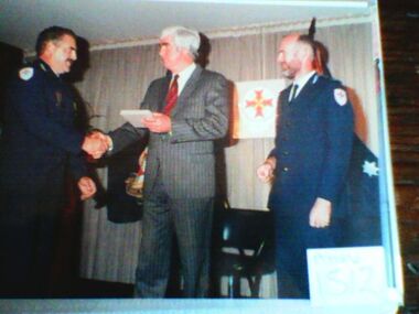Photograph, award presentation to Bill McNally, 1988 to 1989