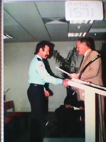 Ambulance Service awards and medals presentation to Peter Watts