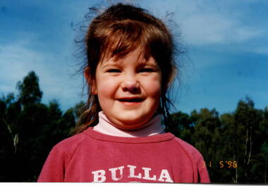A coloured photograph of a former student from Bulla Primary School 