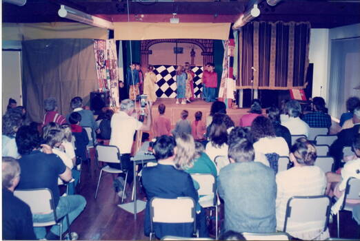 An overview of the audience and hall taken from the rear.