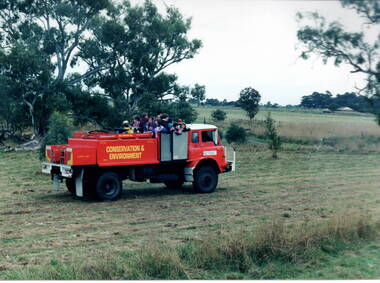 Some children are being taken for a ride in a CFA fire truck around Gellibrand Hill near Bulla.