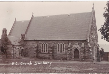 A post card photograph of the bluestone R.C. Church in Sunbury.