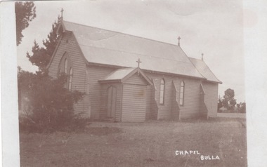 A post card with a sepia photograph of a  simple weatherboard chapel at the Bulla township. It is St. Michaels Catholic Church.