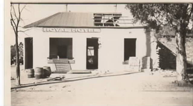 A single storey building is being demolished.