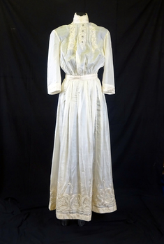 Cream silk wedding dress belonging to Mary Schwerkolt (front)