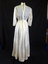 Cream silk wedding dress belonging to Mary Schwerkolt (back)