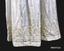 Cream silk wedding dress. High neck with a stand up shaped collar in the Queen Mary style.