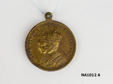 Medal - King George VI and Queen Elizabeth on one side - 'To Commemorate Their Majesties' Coronation' on reverse.