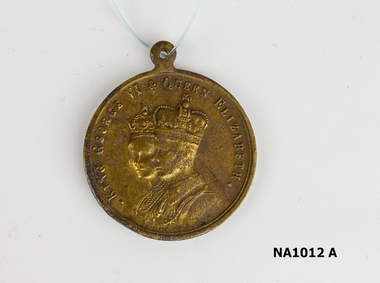 Medal - King George VI and Queen Elizabeth on one side - 'To Commemorate Their Majesties' Coronation' on reverse.