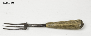 Three pronged fork with wooden handle