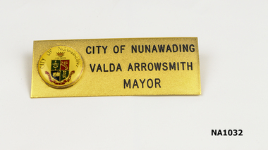  Gold plated oblong badge with City of Nunawading Circular badge. 