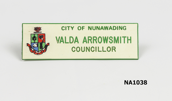 White oblong badge with 'City of Nunawading' / Valda Arrowsmith/ Councillor