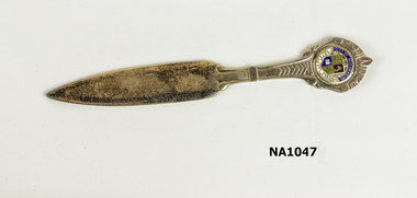 Silver coated letter opener with 'City of Nunawading' and Coat of Arms on top of handle