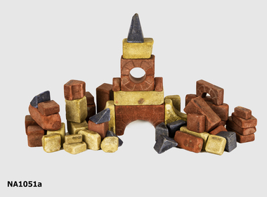 50 sandstone toy building blocks with maps