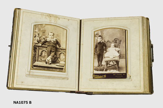 Leather covered photo album with metal clasp containing photographs of  the family of Arthur Howden. 