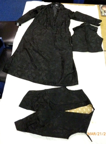 1920s Black silk brocade gown lined with sateen trimmed with jet sequins and beads.