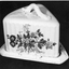 Wedged shaped cheese stand high lid.